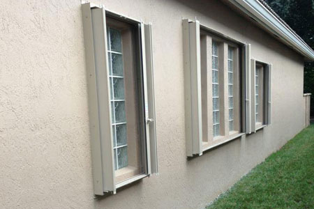 hurricane shutter side door